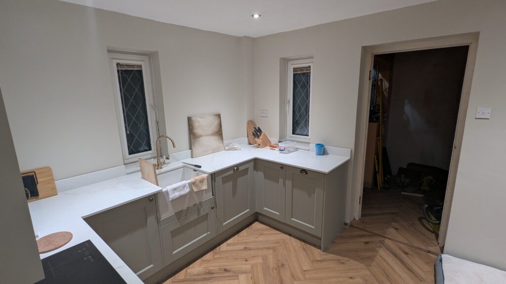 Howdens Sage Green kitchen main worktop workstation