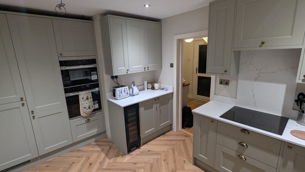 Howdens Sage Green kitchen bar area