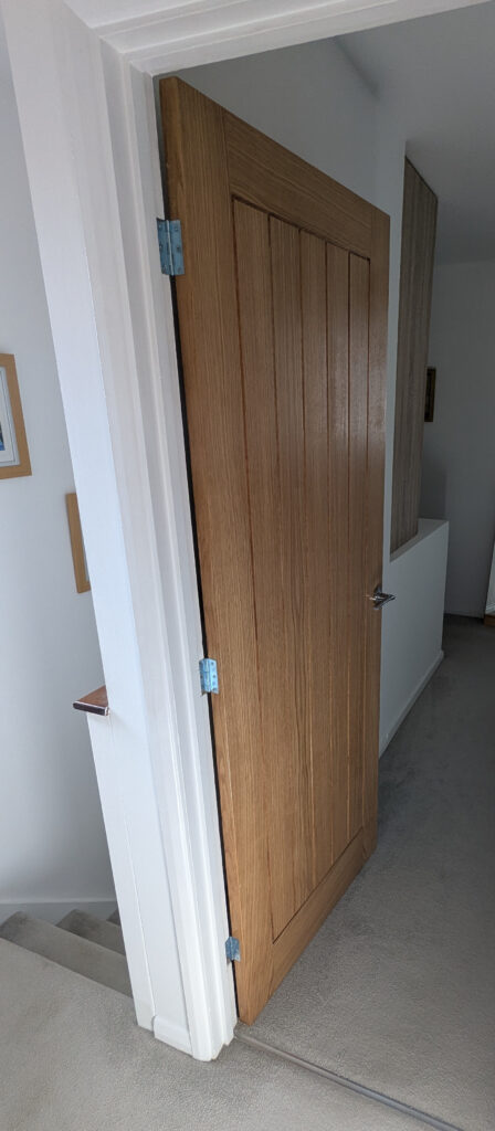 Satin finished cottage-style oak door installed