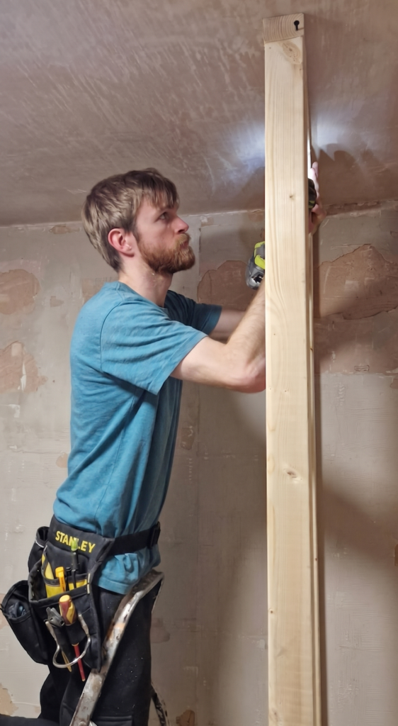 James from Keystone Home Services installing stud walling